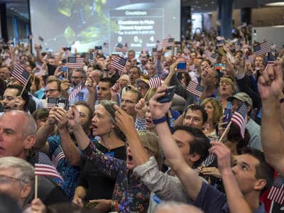 Guest and New Horizons team members countdown to the spacecraft's closest approach to Pluto, Tuesday, July 14, 2015 at the Johns Hopkins University Applied Physics Laboratory (APL) in Laurel, Maryland. Photo Credit: (NASA/Bill Ingalls)